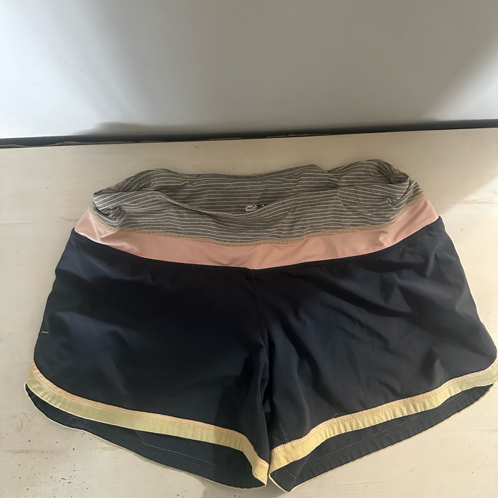 Lululemon Athletica Running Shorts Gray Peach and Light Yellow.